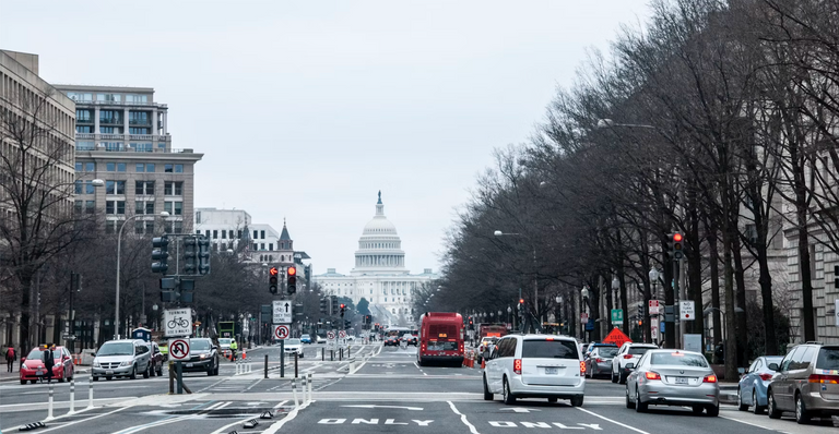 Zoomed out street image of capitol building